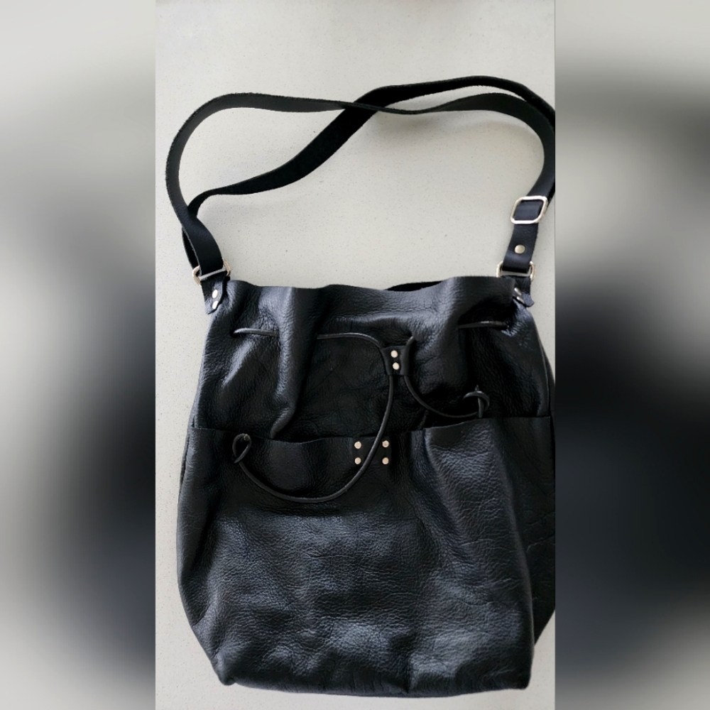 Locally hand-made leather bucket bag